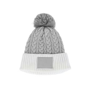 Cable Knit Beanie With Faux Fur Pom
