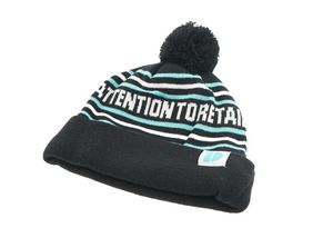 Woven Label Pom-Pom Beanie